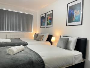 Ένα ή περισσότερα κρεβάτια σε δωμάτιο στο 4 Bedroom 2 Bathroom Shared House - Near BHX and NEC
