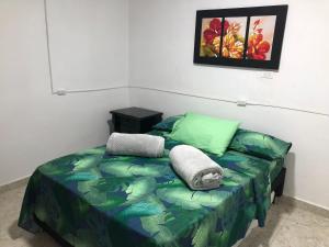 Ένα ή περισσότερα κρεβάτια σε δωμάτιο στο OLIVA´S HOUSE