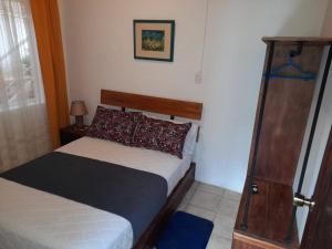 Postel nebo postele na pokoji v ubytování Casa Verde Descanso 1