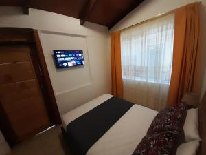 Postel nebo postele na pokoji v ubytování Casa Verde Descanso 1