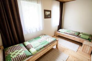 Ein Bett oder Betten in einem Zimmer der Unterkunft Waldhotel Bad Jungbrunn