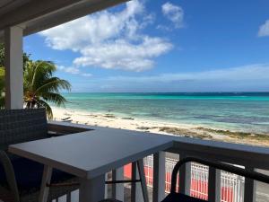 a view of the beach from the balcony of a resort at Stay BnB in Nassau