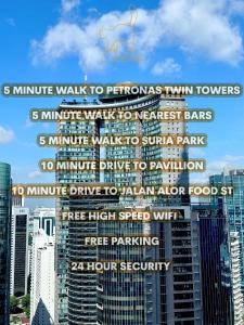 un grupo de señales en el lateral de un edificio en High Floor Lux Apartment Across KLCC, en Kuala Lumpur