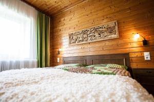 Giường trong phòng chung tại Waldhotel Bad Jungbrunn