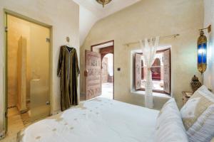 Postel nebo postele na pokoji v ubytování Riad La Fayette Bed & Breakfast