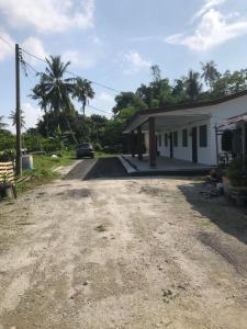 a car parked in front of a building at Homestay Siti Klang in Klang