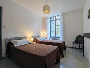 Ένα ή περισσότερα κρεβάτια σε δωμάτιο στο Gîte Saint-Julien-des-Chazes, 4 pièces, 6 personnes - FR-1-582-11