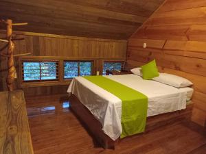 Un pat sau paturi într-o cameră la Punta Bonita