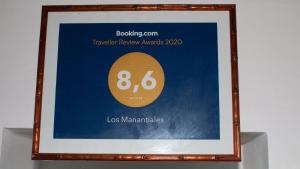 ein gerahmtes Bild eines Zeichens für verlorene Marlins in der Unterkunft Los Manantiales in Tanti