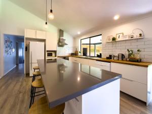 Kjøkken eller kjøkkenkrok på Shailer Park Serenity