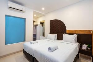Ένα ή περισσότερα κρεβάτια σε δωμάτιο στο Cove De Tinaya