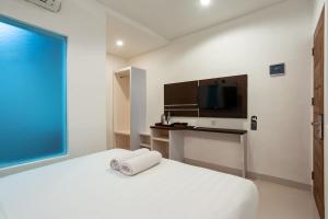 Ένα ή περισσότερα κρεβάτια σε δωμάτιο στο Cove De Tinaya