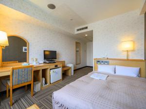 Katil atau katil-katil dalam bilik di Hotel Green Park Suzuka