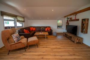 Posezení v ubytování Ferienwohnung Almdoodle