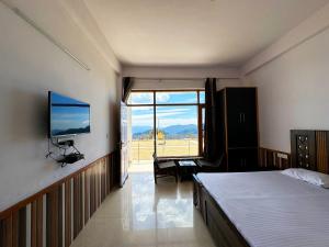 TV a/nebo společenská místnost v ubytování Hawk Eye Resort