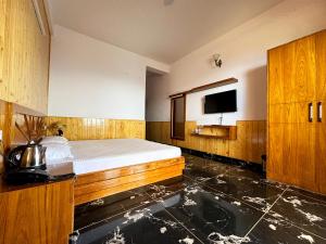 TV a/nebo společenská místnost v ubytování Hawk Eye Resort