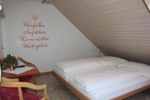 Postelja oz. postelje v sobi nastanitve Wirtshaus Rütihof
