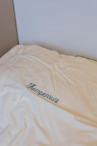 Hotel Kempenrust房間的床