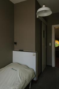 Hotel Kempenrust房間的床