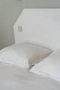 Hotel Kempenrust房間的床