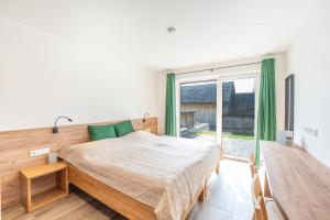 Postelja oz. postelje v sobi nastanitve Appartementhaus Longa Stubn