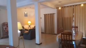 Posezení v ubytování Dew Lee Homestay & Farm House