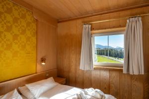 A bed or beds in a room at MyTime Hotels Savoy Még 37 kép