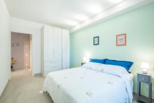 Postel nebo postele na pokoji v ubytování Casa nel cuore di Radicondoli