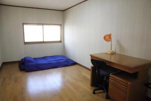 Letto o letti in una camera di 上田屋　半田館