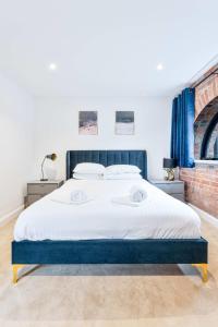 Voodi või voodid majutusasutuse Stunning 1 Bed Apartment in Burton-on-Trent toas