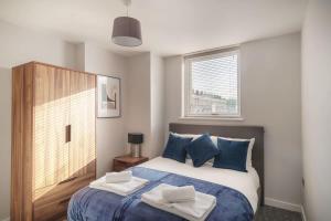 Katil atau katil-katil dalam bilik di Modern 1 Bedroom Liverpool Apartment