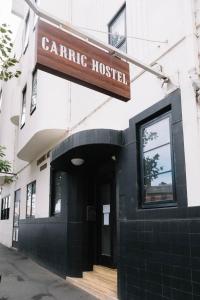 a building with a sign for a cardiac hospital at CarricHostel in Melbourne