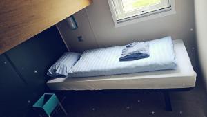 Ένα ή περισσότερα κρεβάτια σε δωμάτιο στο O'Hara Living