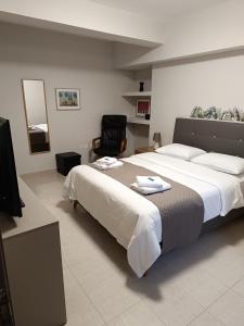 Ένα ή περισσότερα κρεβάτια σε δωμάτιο στο CHRISTINA'S GARDEN HOUSE