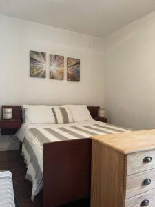 Postel nebo postele na pokoji v ubytování La Petite Maison Rustique
