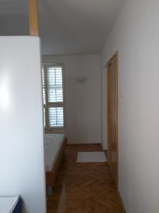 Posteľ alebo postele v izbe v ubytovaní Apartment Bugenvila