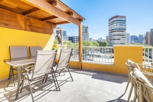 A balcony or terrace at Penthouse Ancla 561 Levante Beach