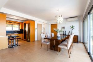 A kitchen or kitchenette at Aigli Luxury Villa - Seaview Panoramic Retreat