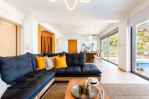 A seating area at Aigli Luxury Villa - Seaview Panoramic Retreat