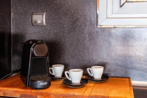 Coffee and tea making facilities at Aigli Luxury Villa - Seaview Panoramic Retreat