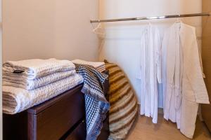 A bed or beds in a room at Aigli Luxury Villa - Seaview Panoramic Retreat