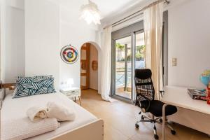 A bed or beds in a room at Aigli Luxury Villa - Seaview Panoramic Retreat
