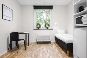 Postel nebo postele na pokoji v ubytování Forenom Hostel Lund Örtofta