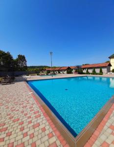 Bazén v ubytování Hotel ELYSIUM nebo v jeho okolí
