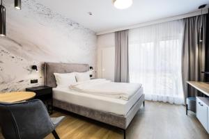 Aparthotel City Break Plac Wolności 6客房内的一张或多张床位