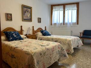 A bed or beds in a room at CASA LA FELICIDAD