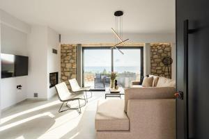 Posezení v ubytování Mani Stone Villa A Paradise of Panoramic Views + 37 fotografií