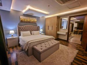 Cama o camas de una habitación en Executive One Bedroom Apartment Opposite Centaurus Mall Islamabad
