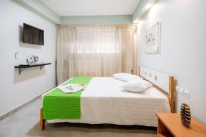 Letto o letti in una camera di Homes Eva's garden -Your Secret Retreat with a Private Pool in Kos
