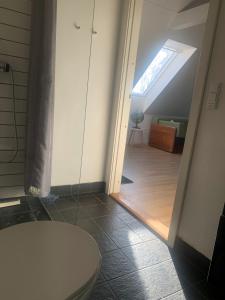 Koupelna v ubytování Drejerindens kreative stemningsfulde lejlighed + 24 fotografií